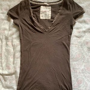 brown Hollister top with lace trim at the top. very form fitting